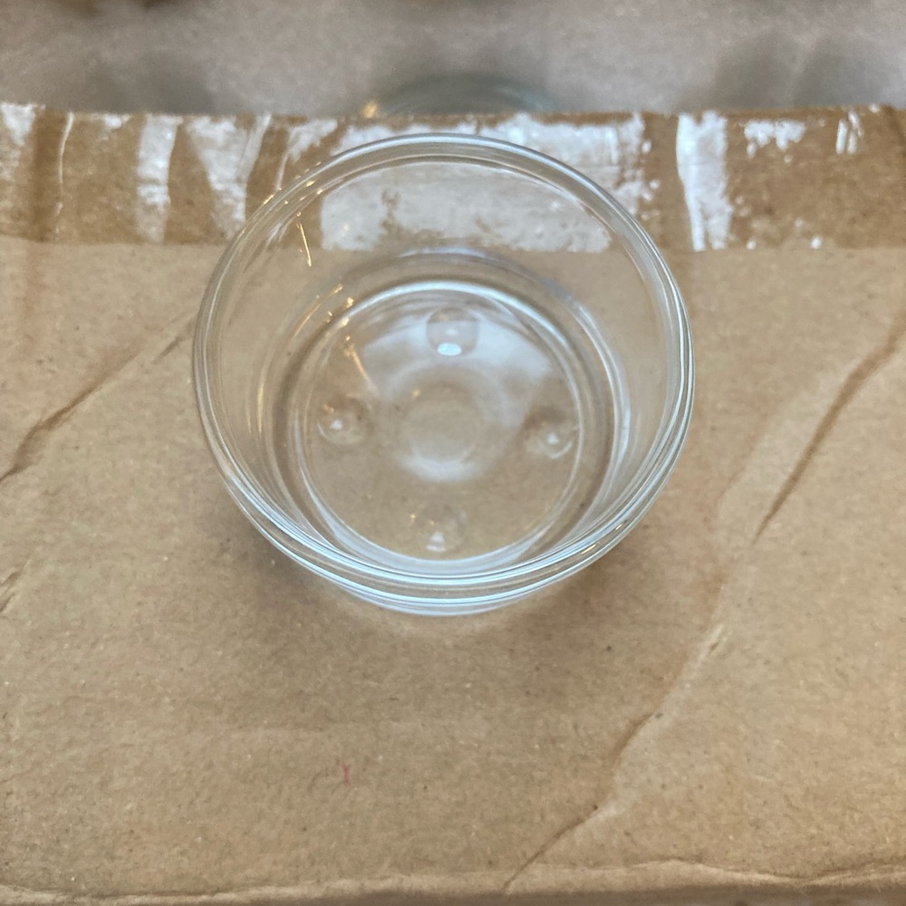 Clear Glass tea light holders.